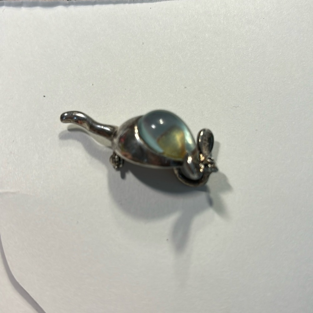 Silver mouse with green stone brooch